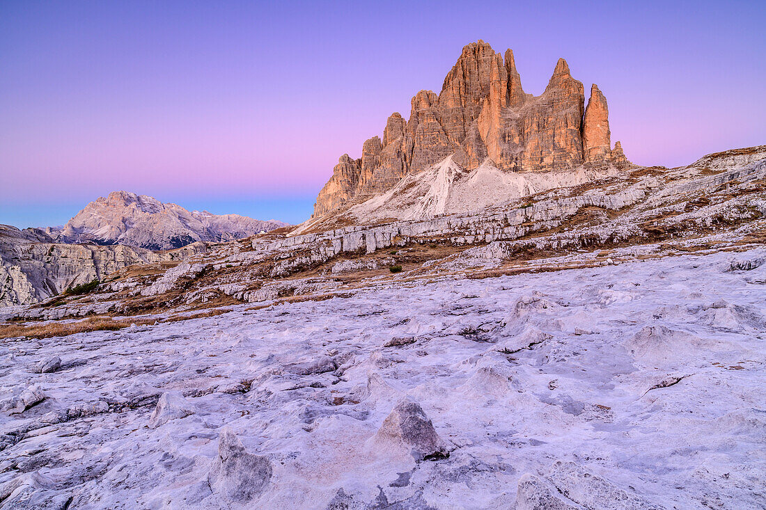 Drei Zinnen at dawn with Karrenfeld in the foreground, Drei Zinnen, Dolomites, UNESCO World Natural Heritage Dolomites, Veneto, Veneto, Italy