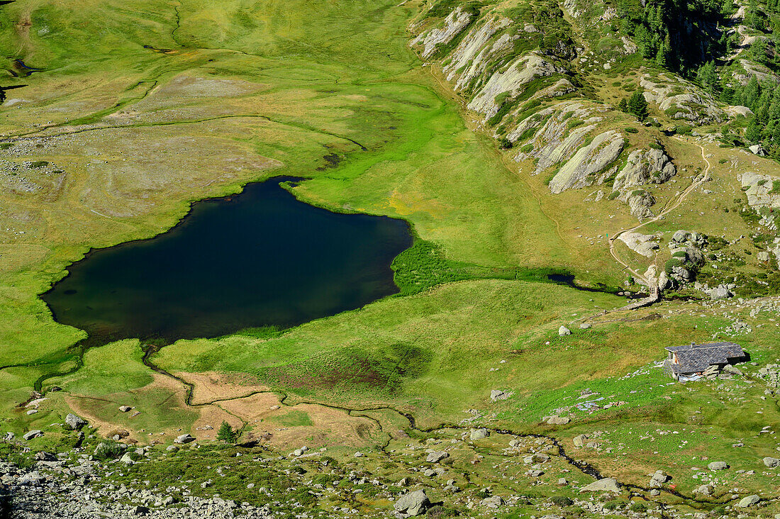 Deep view of Lacs du Glacier and alpine buildings, Rutor Group, Graian Alps, Aosta, Italy