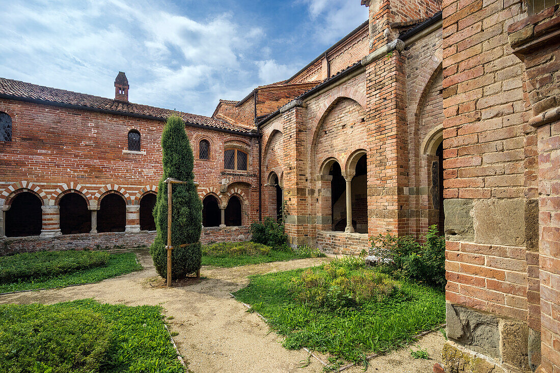 The enchanting cloister of the Abbazia di Vezzolano, Piedmont, Italy, Europe