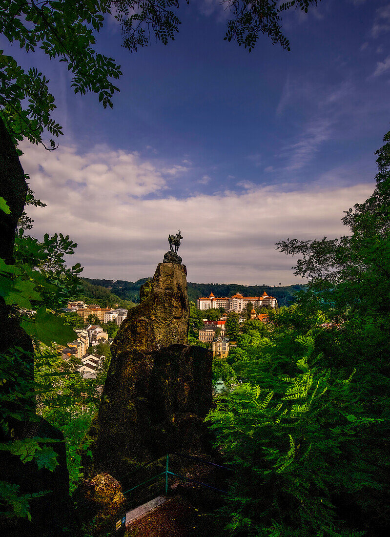 Chamois rock at the so-called Hirschsprung (Jeleni skok) in the city forest of Karlovy Vary (Karlovy Vary) with a view of the spa district, Czech Republic