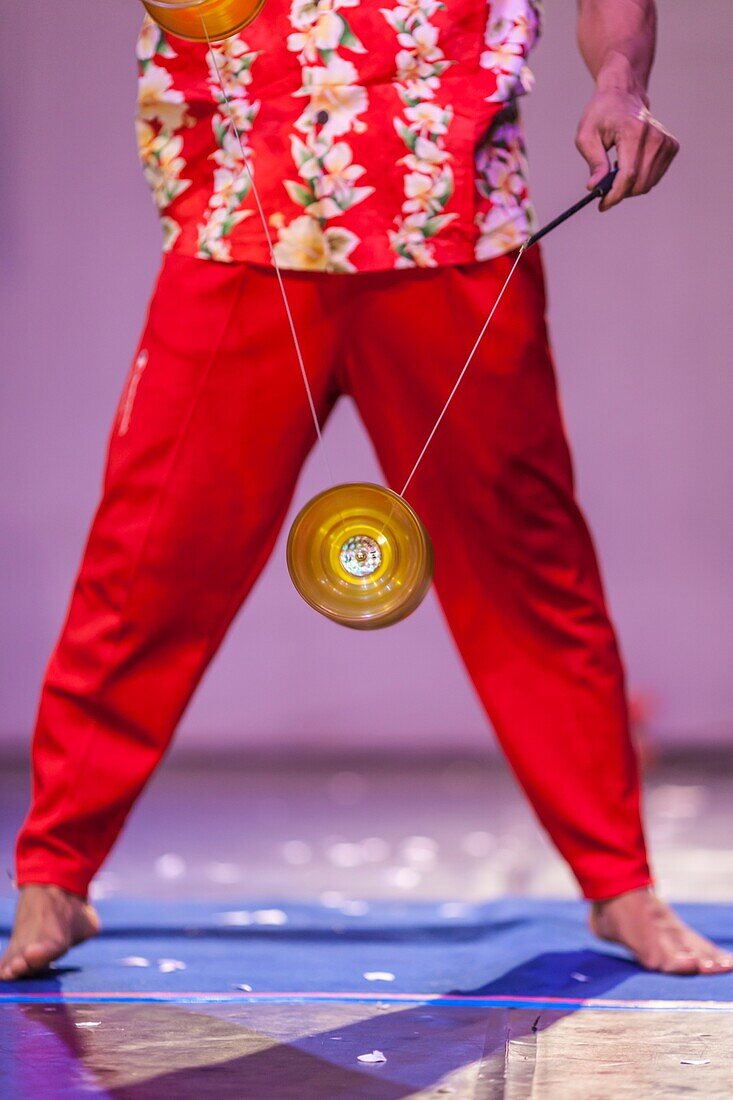 Cambodia,Battambang,Phar Ponleu Selpak,arts and circus school,juggler with top during circus performance,ER.