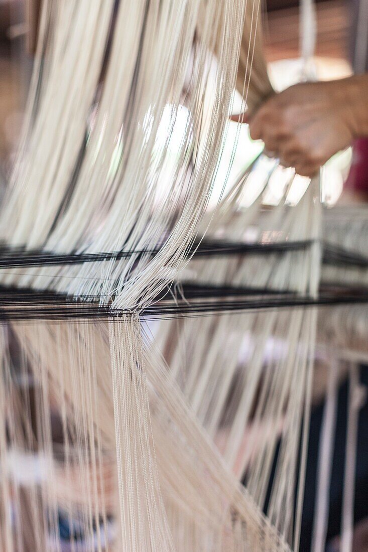 Laos,Vientiane,traditional Lao textile loom.