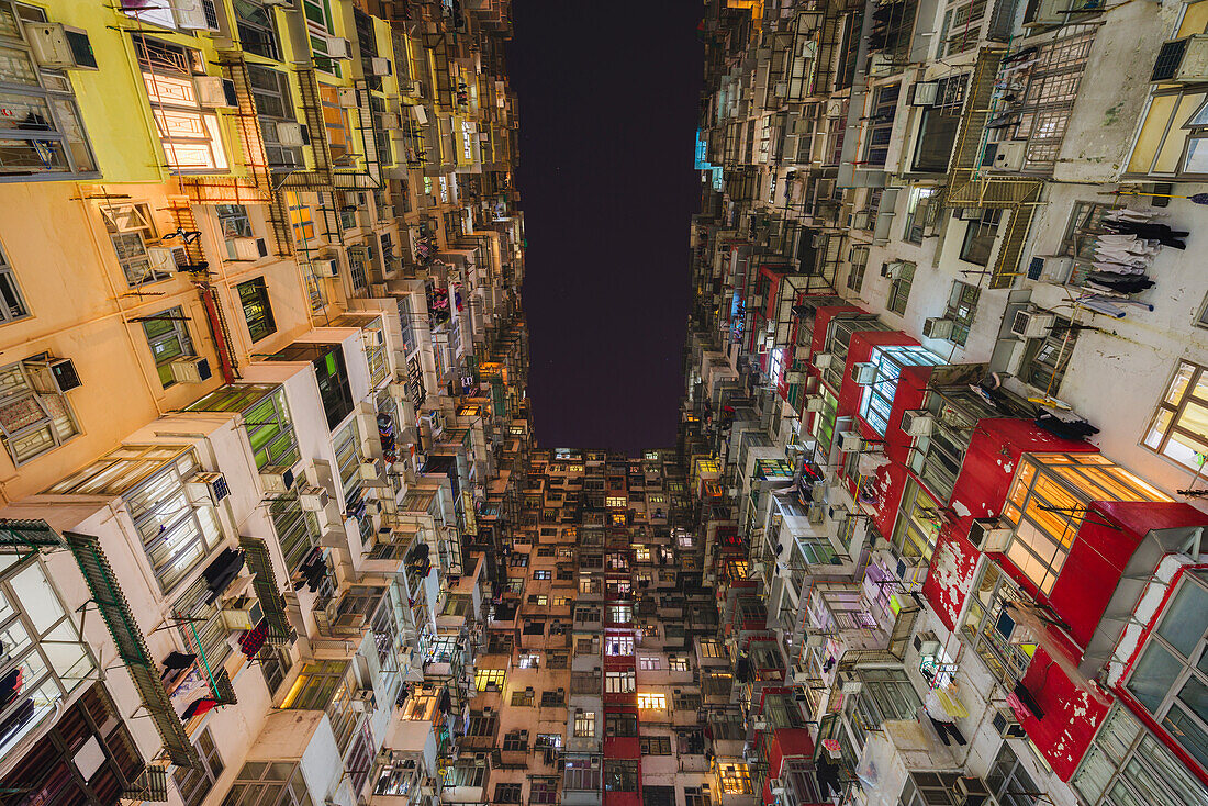 Low angle view of balconies and windows of Monster Building in Quarry Bay, Hong Kong