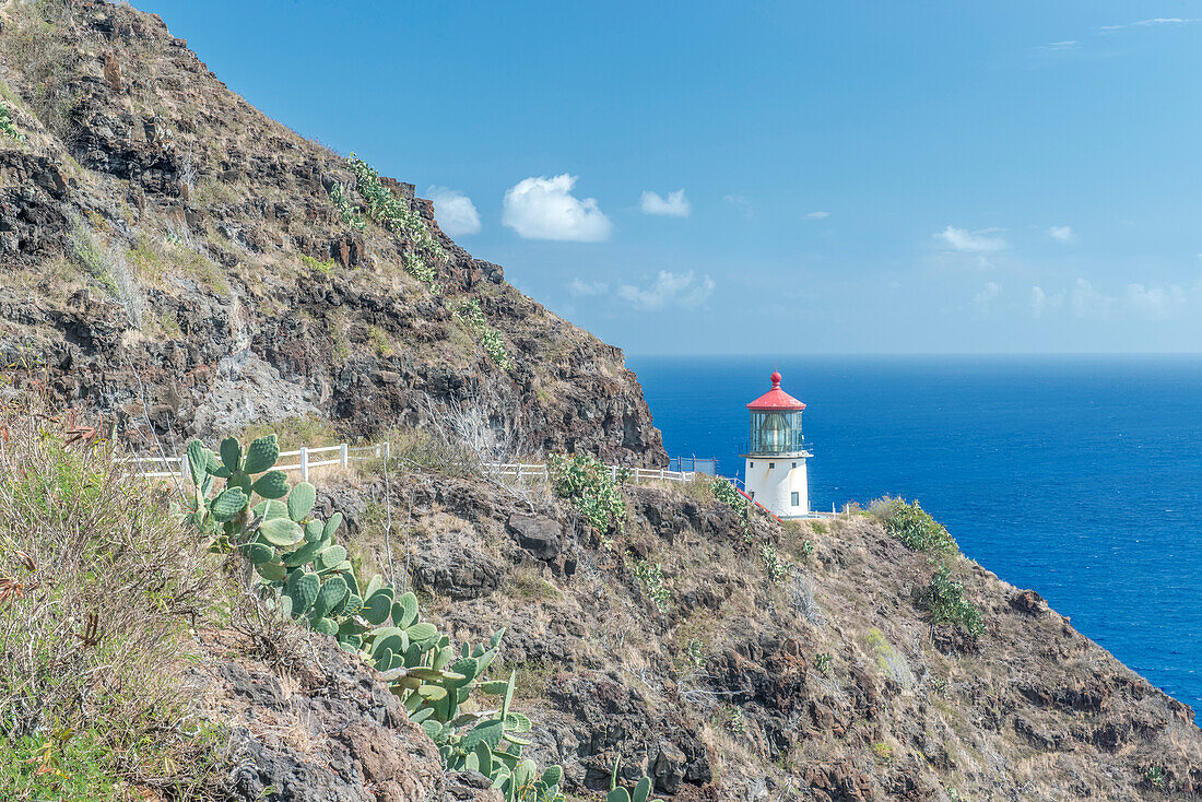 Lighthouse on hillside at Makapuu Point, Oahu, USA