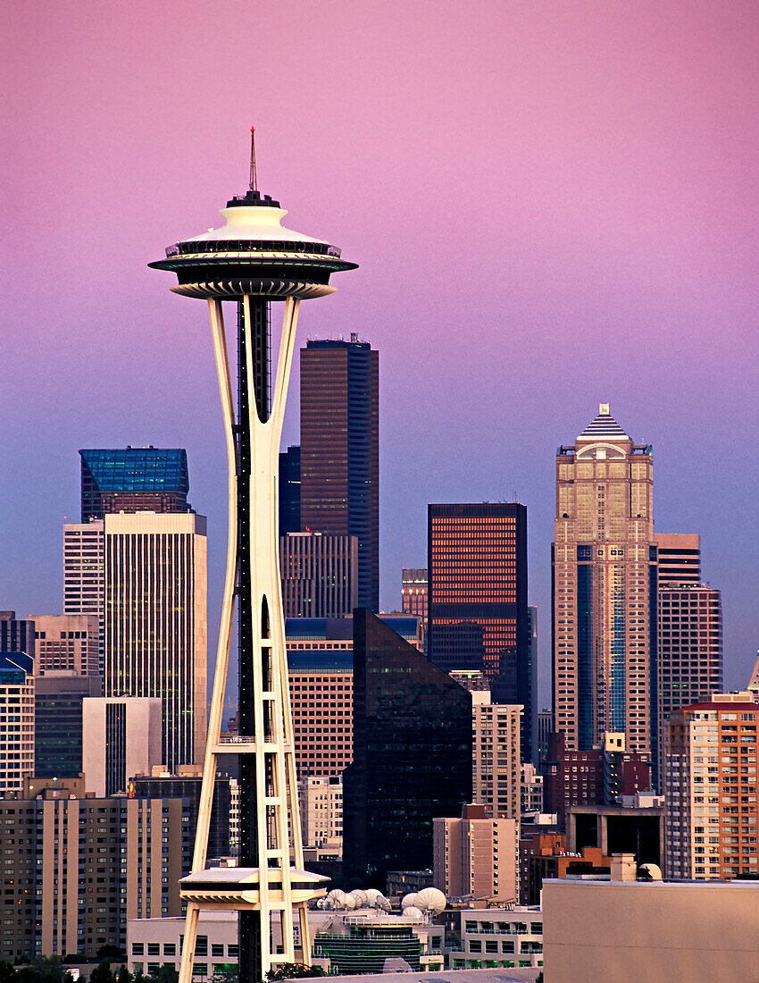 Modern Seattle skyline at sunset, including space needle and skyscrapers, USA