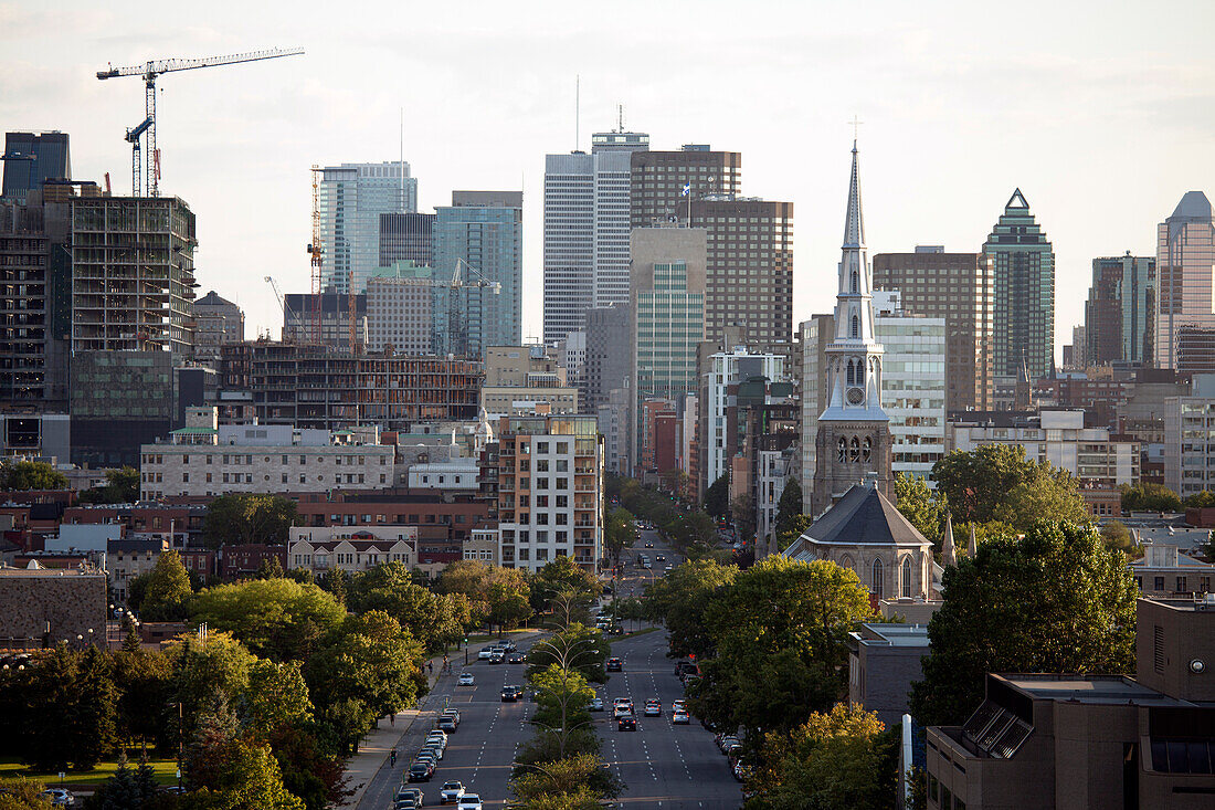 Elevated view of Quebec city, green space, tall buildings, major road and construction, Canada