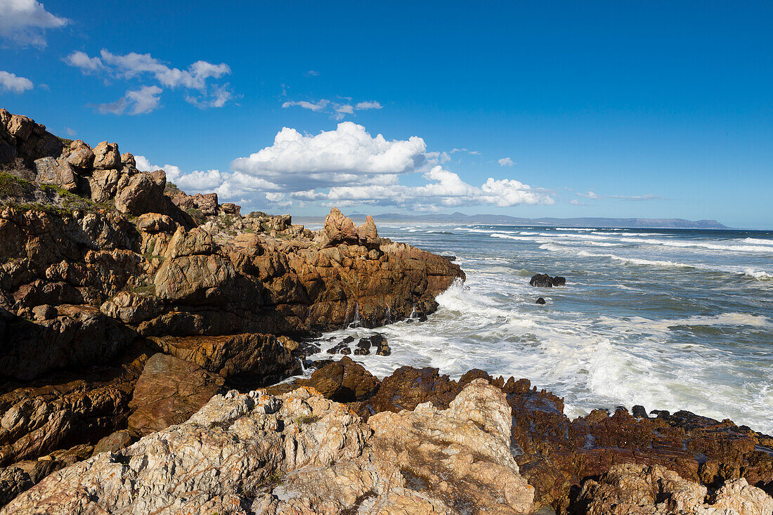 Surf waves breaking on a rocky shore, on the Atlantic coastline