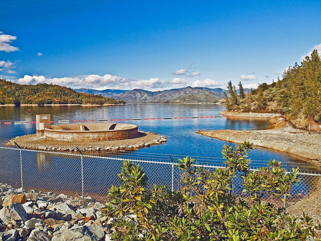 Whiskeytown Lake ''glory hole'' is an overflow drain not the same as a spillway but is available to prevent overflow from excess water behind the dam.