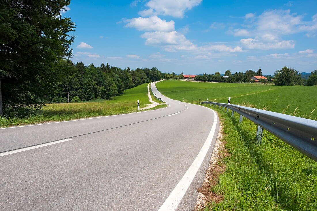 A rural mountain road in Bavaria,Upper Bavaria,Germany,Europe.