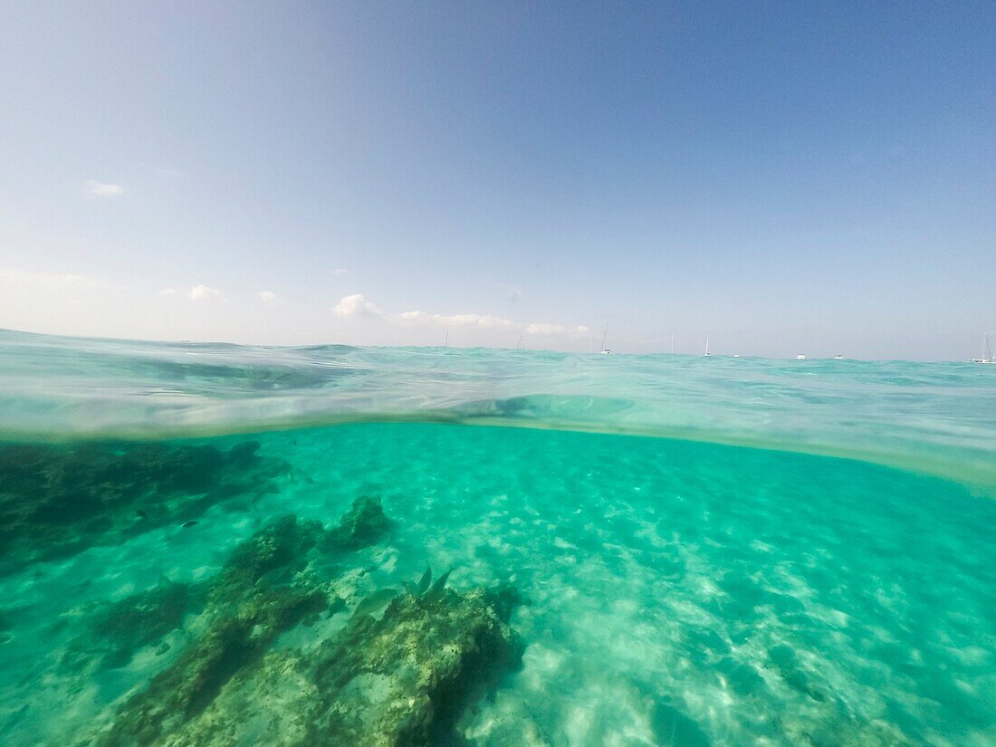Underwater the turquoise water in El Calo de San Agusti Formentera island Balearics Spain.