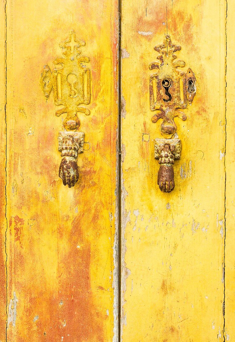 historic doorknockers in the form of hands,lagos,algarve,portugal.