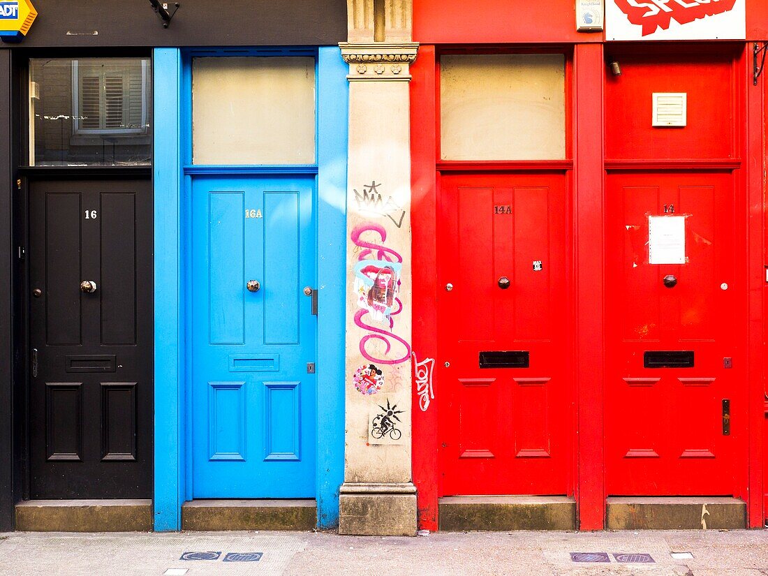 Colourful doors in Cheshire street near Brick lane - London,England.