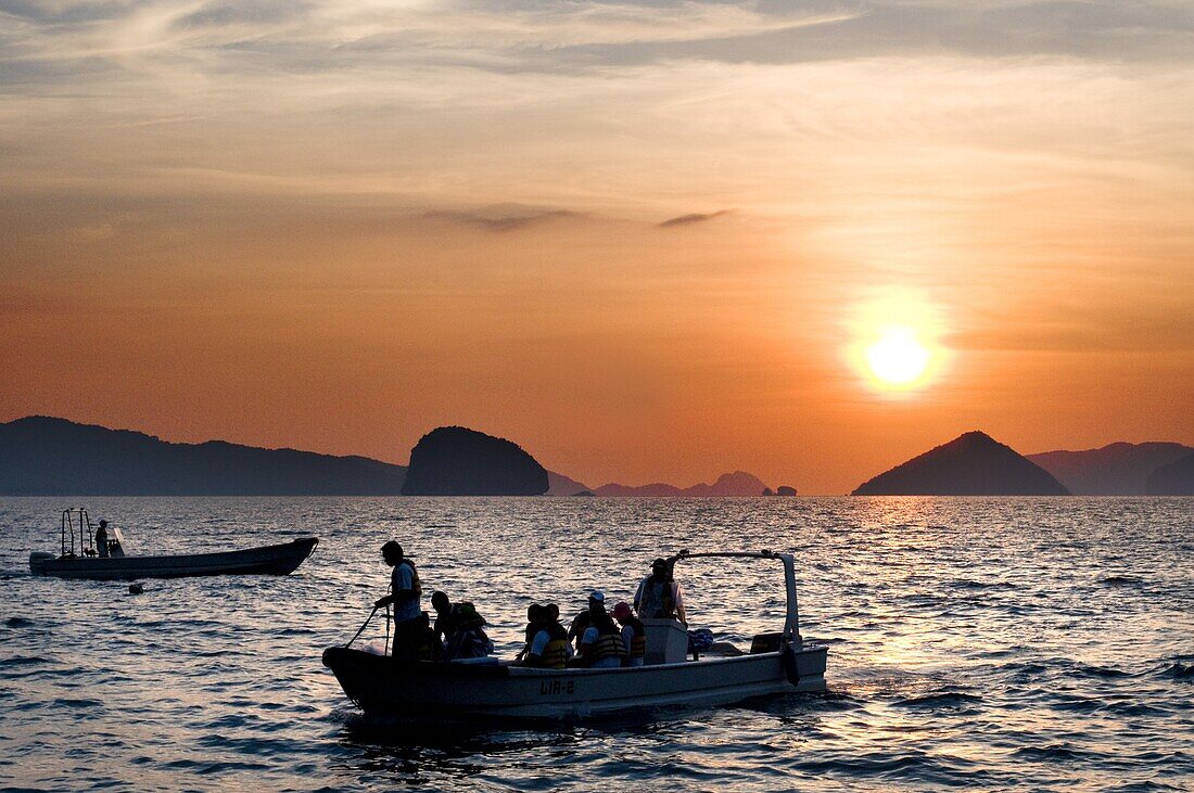 A boat sails through the South China Sea. The nest. Palawan. Palawan s El Nido stunning scenery made of limestone hills and lagoons El Nido The Philippines.