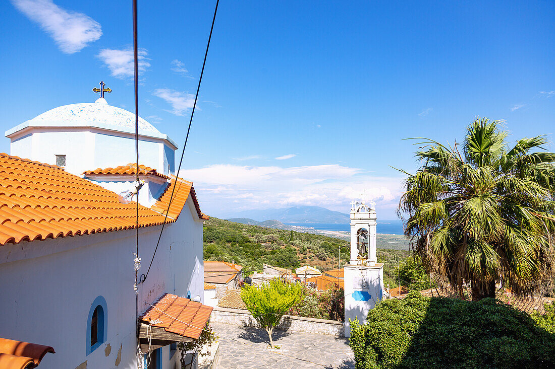 Mountain village of Kouramadei, Agios Panteleimon church with a view of the east coast and towards Turkey, Samos island in Greece