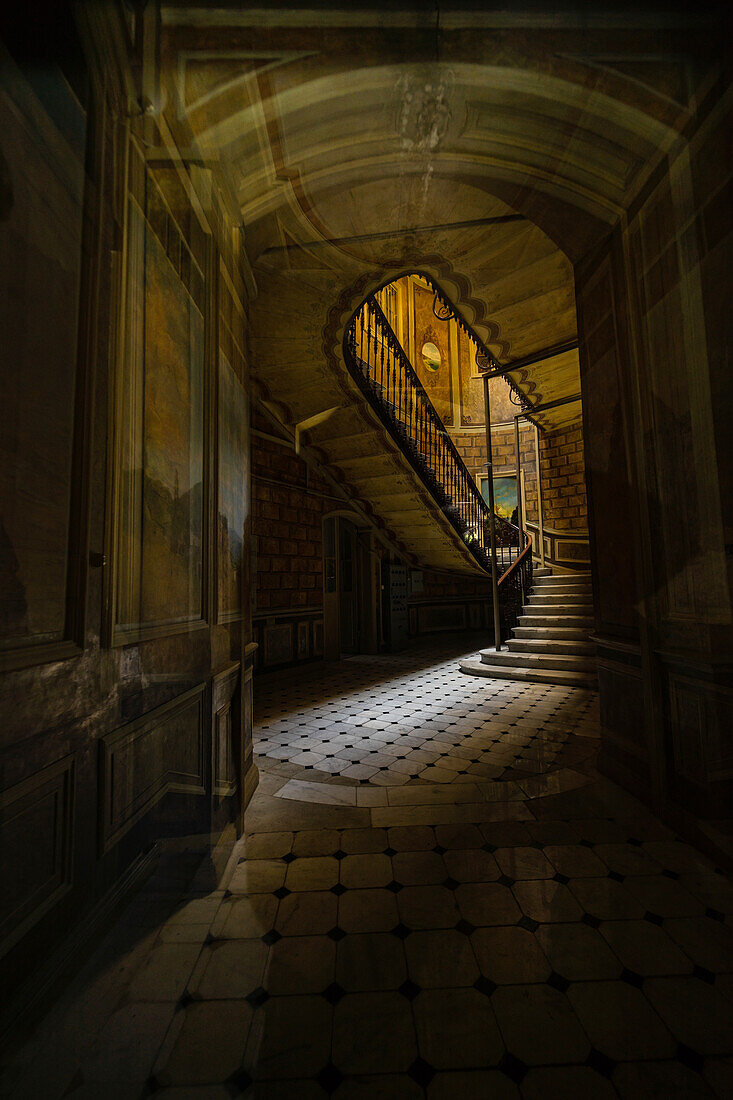 Old Tbilisi's maison stairways with spiral staircase decorated with carving metal holder