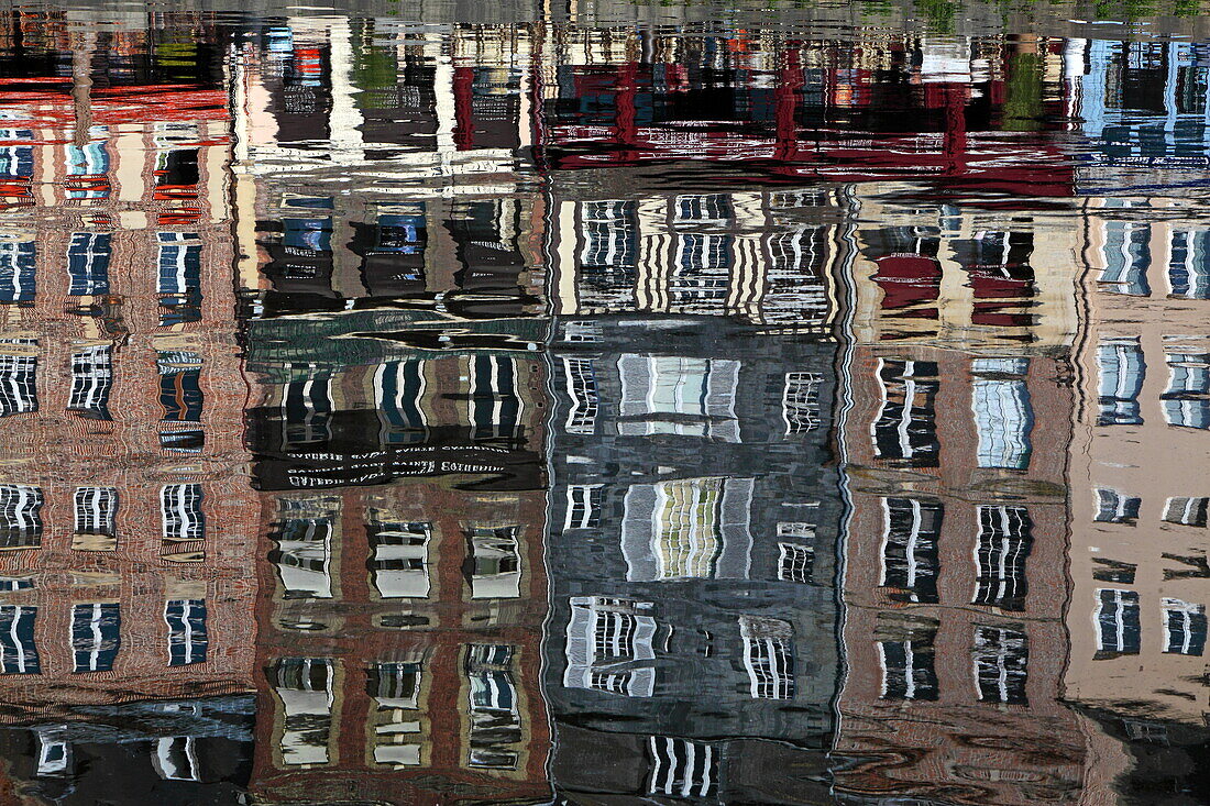 Reflection of houses at the old harbor of Honfleur, Côte Fleurie, Normandy, France