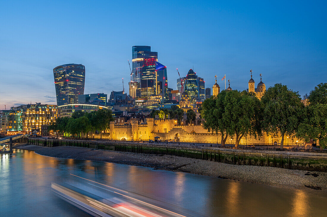 The London City Skyline with the Tower of London, UNESCO World Heritage Site, at sunset, London, England, United Kingdom, Europe