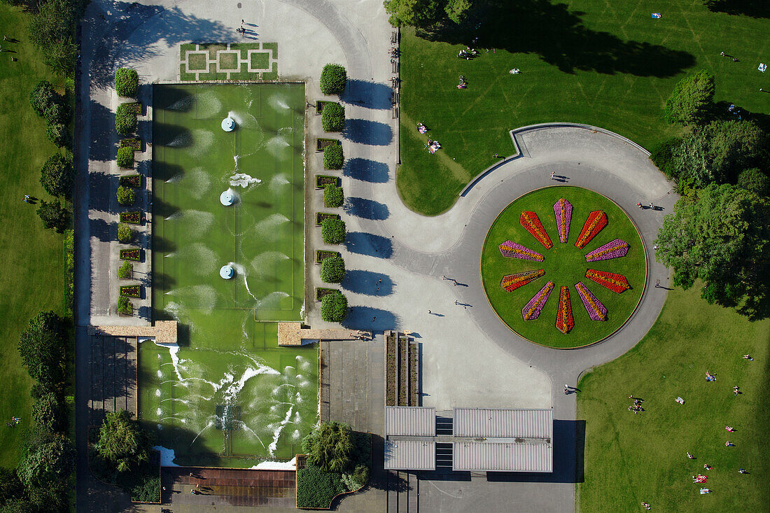 UK, London, Overhead view of lawn with sprinklers at Battersea Park