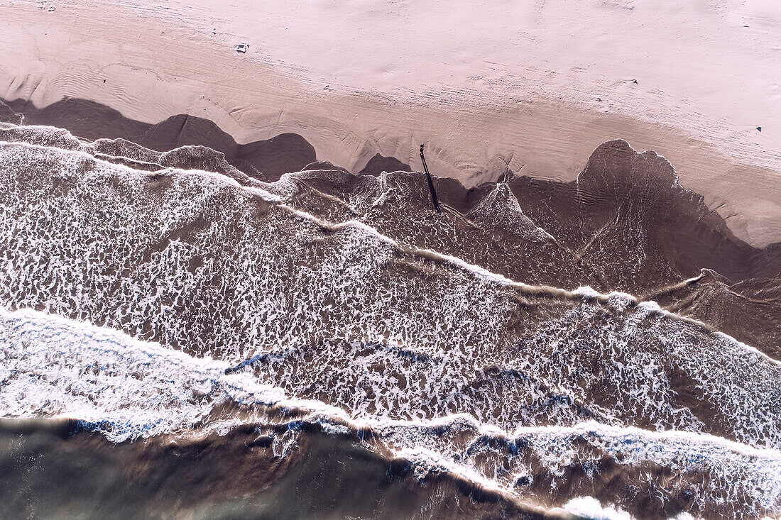 Spain, Valencia, Overhead view of sea waves beach