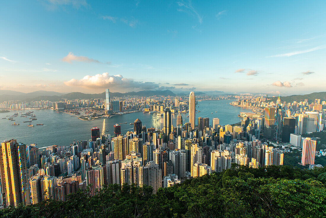 Aerial view of modern cityscape with Victoria Harbour in Hong Kong