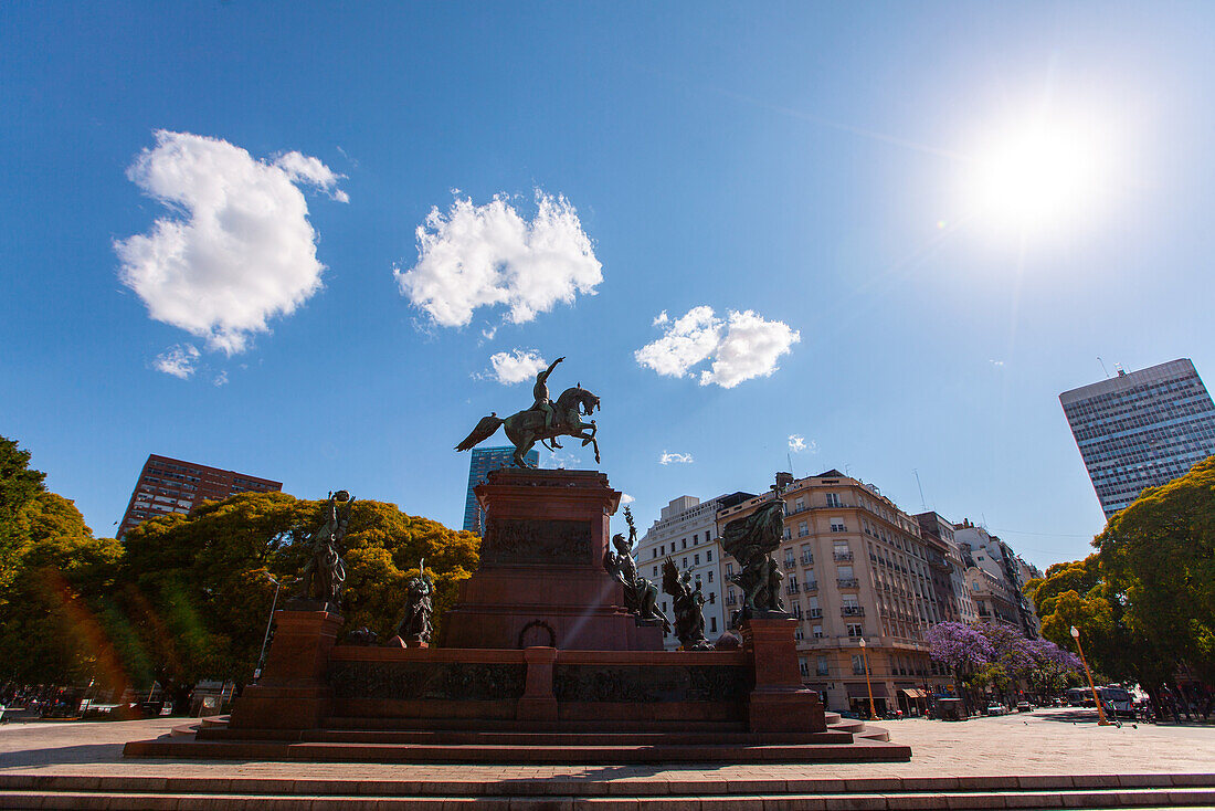 View of monument at Plaza San Martin against cloudy sky