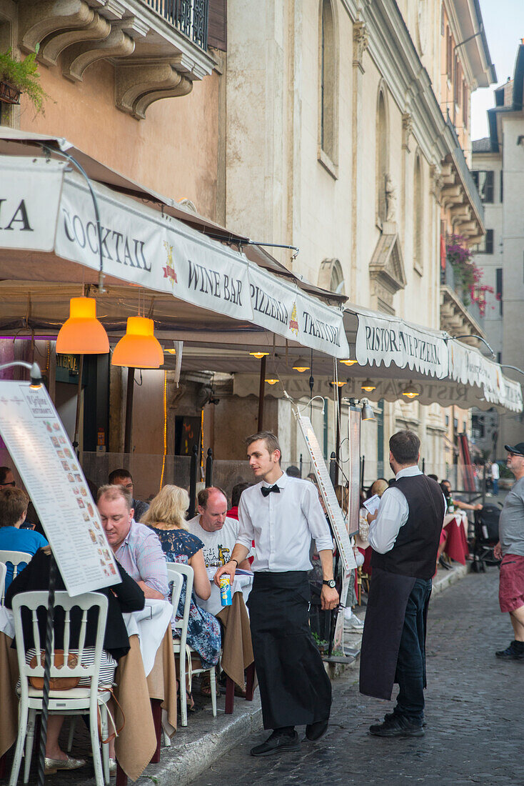 Waiter and outdoor cafe tables, Piazza Navona, Rome, Lazio, Italy, Europe
