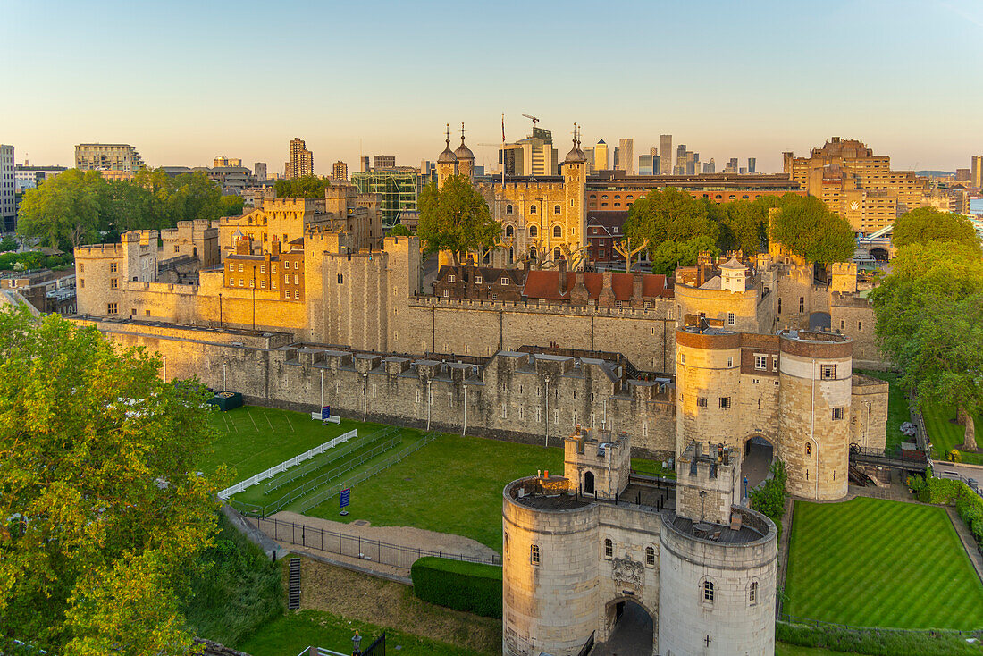 View of the Tower of London, UNESCO World Heritage Site, from Cheval Three Quays at sunset, London, England, United Kingdom, Europe