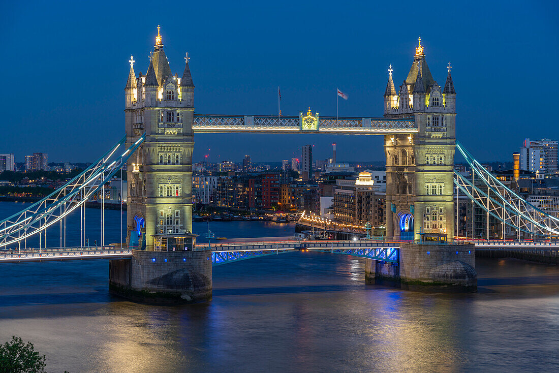 View of Tower Bridge from Cheval Three Quays at dusk, London, England, United Kingdom, Europe