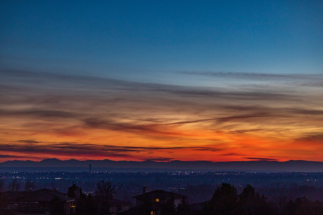 United States, Idaho, Boise, Sunset above city and mountains