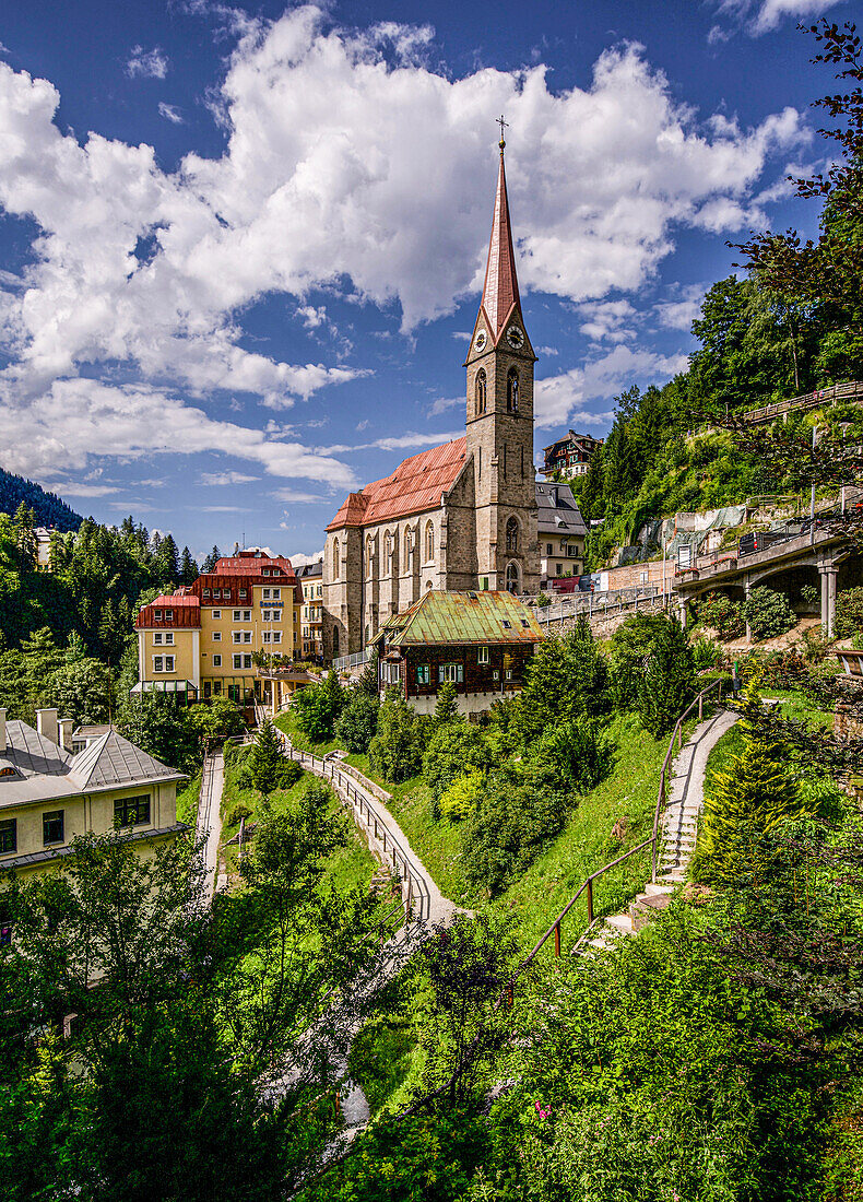 Termalquellpark and the parish church in Bad Gastein, Gasteinertal, Salzburger Land; Austria