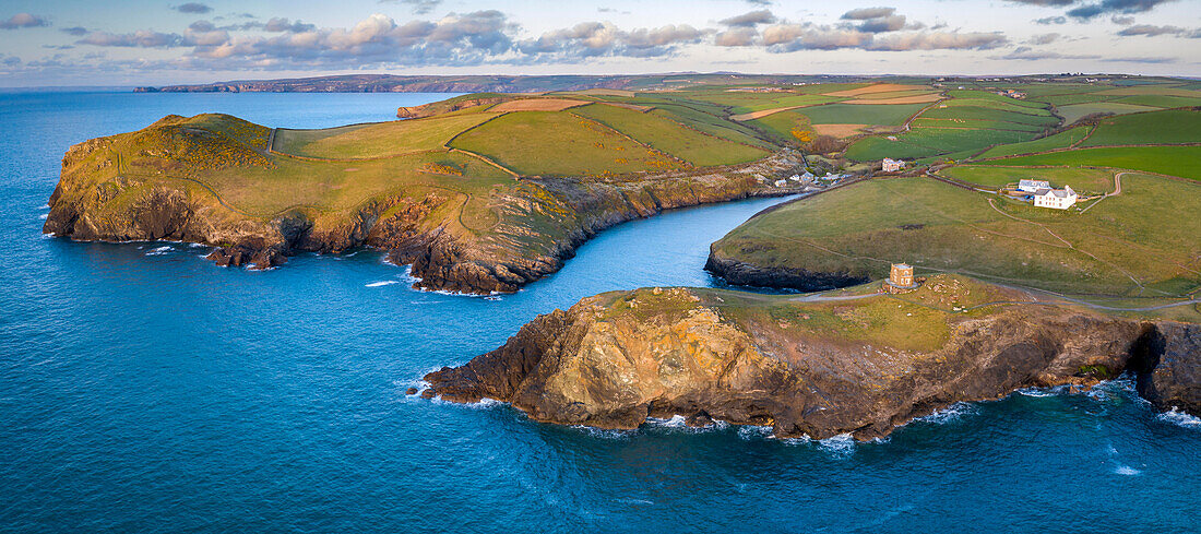 Aerial vista of Doyden Castle on the headland at Port Quin in spring, Cornwall, England, United Kingdom, Europe