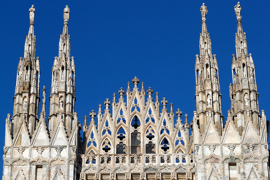Milan Cathedral. The west facade of the Duomo. The Gothic style cathedral is dedicated to St Mary. Italy.
