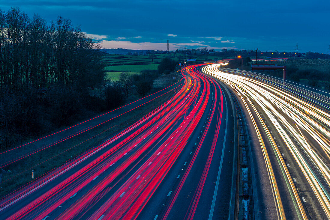 View of traffic trail lights on M1 motorway near Chesterfield, Derbyshire, England, United Kingdom, Europe