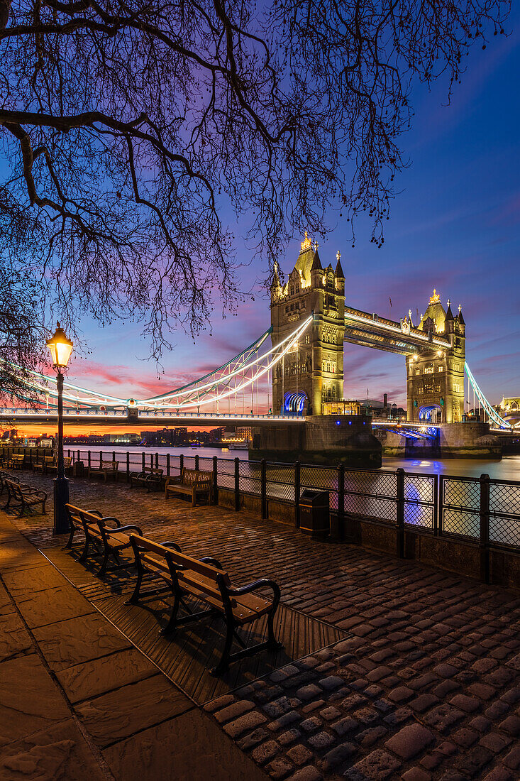 Sunrise view of Tower Bridge from Tower Wharf, Tower of London, London, England, United Kingdom, Europe