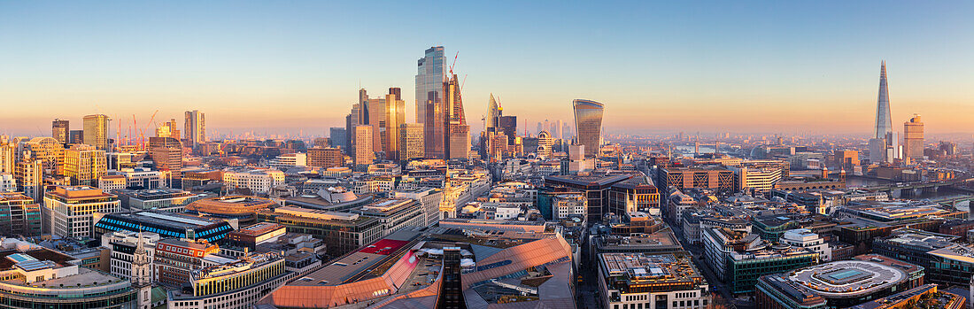 Panoramic aerial view of London City skyline at sunset taken from St. Paul's Cathedral, London, England, United Kingdom, Europe