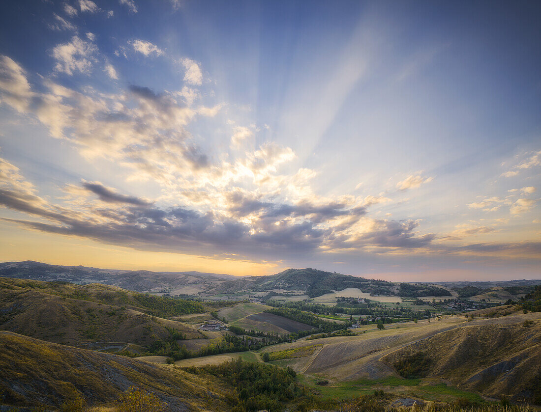 Countryside landscape at sunset with a sky full of clouds, Emilia Romagna, Italy, Europe