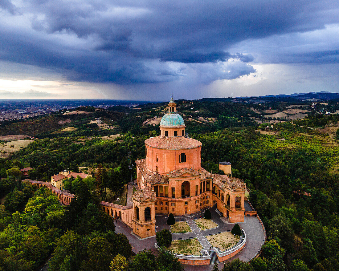 Sanctuary of Madonna di St. Luca, the symbol of Bologna, at sunset during a storm, Bologna, Emilia Romagna, Italy, Europe