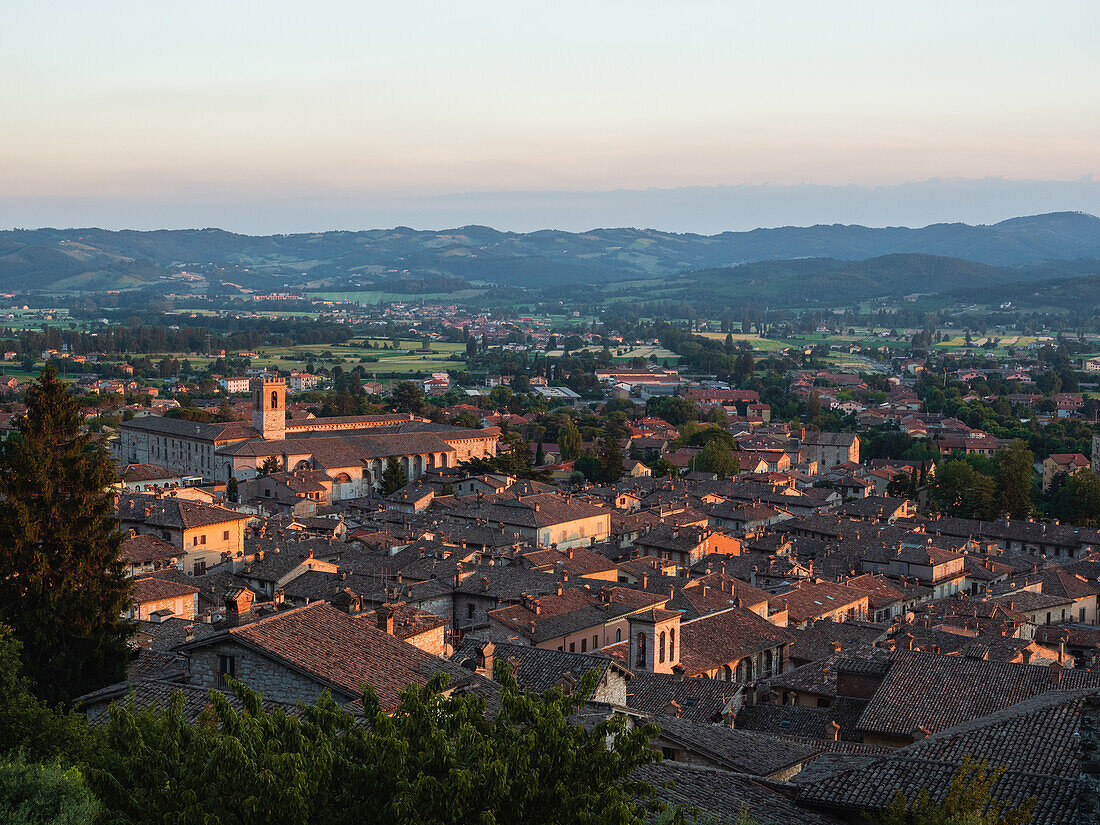 Gubbio's old town cityscape at sunset, Gubbio, Umbria, Italy, Europe