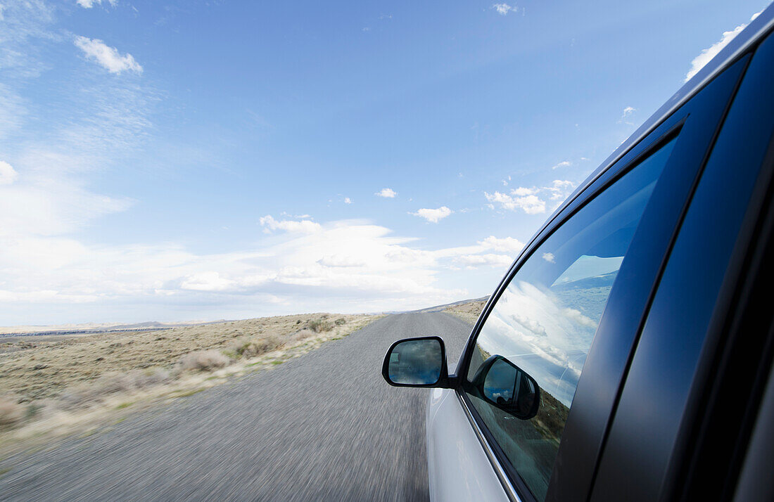 Usa, Wyoming, Rural road seen from car