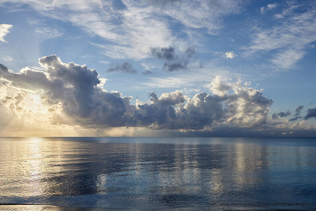 Clouds over ocean at sunrise