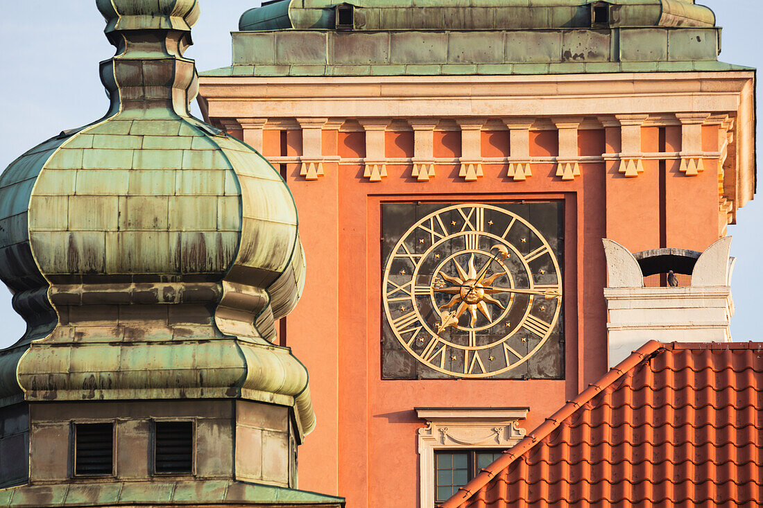 Poland, Masovia, Warsaw, Clock face on castle tower in old town