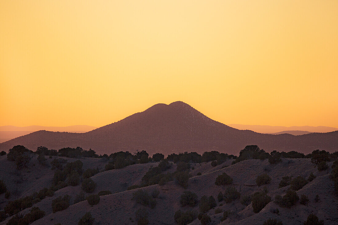 LATE EVENING LIGHT OVER THE CERRILLOS, FROM GALISTEO BASIN PRESERVE, LAMY, NM, USA