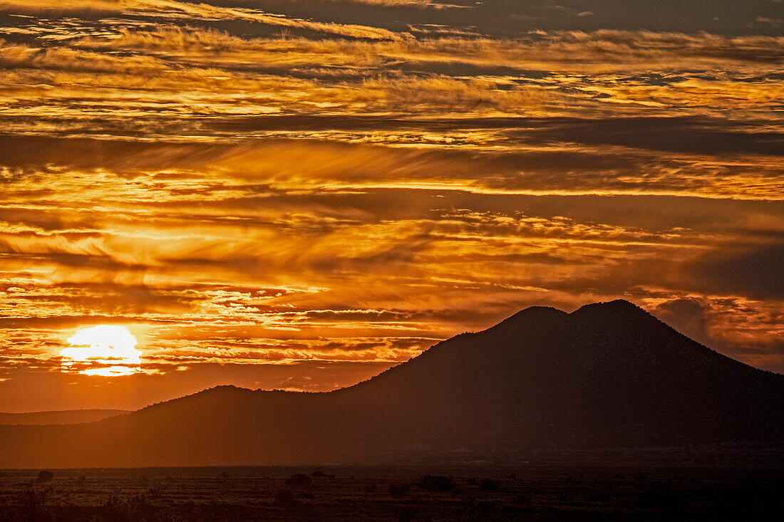SUNSETS OVER THE CERRILLOS, FROM EL DORADO, NEW MEXICO, USA