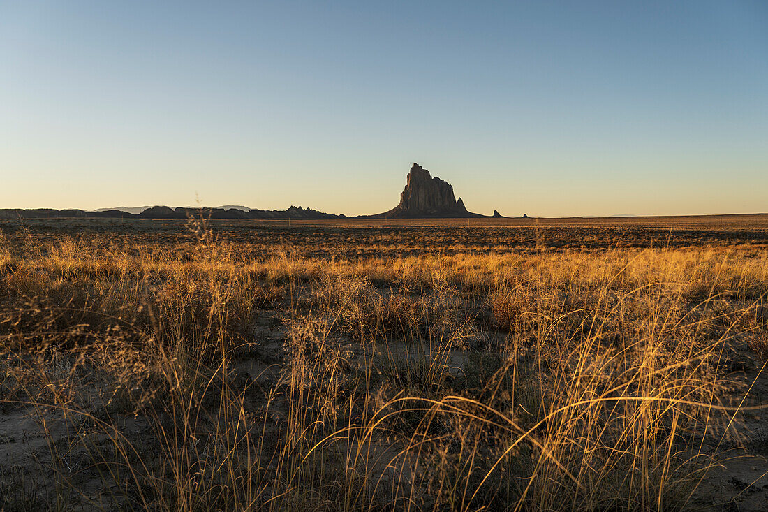 USA, New Mexico, Desert landscape with Ship Rock in distance