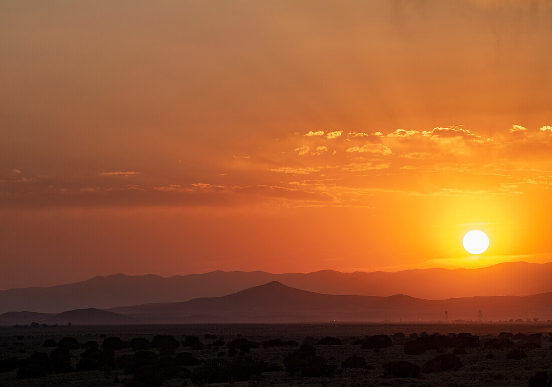 USA, New Mexico, Santa Fe, Sun setting over High Desert