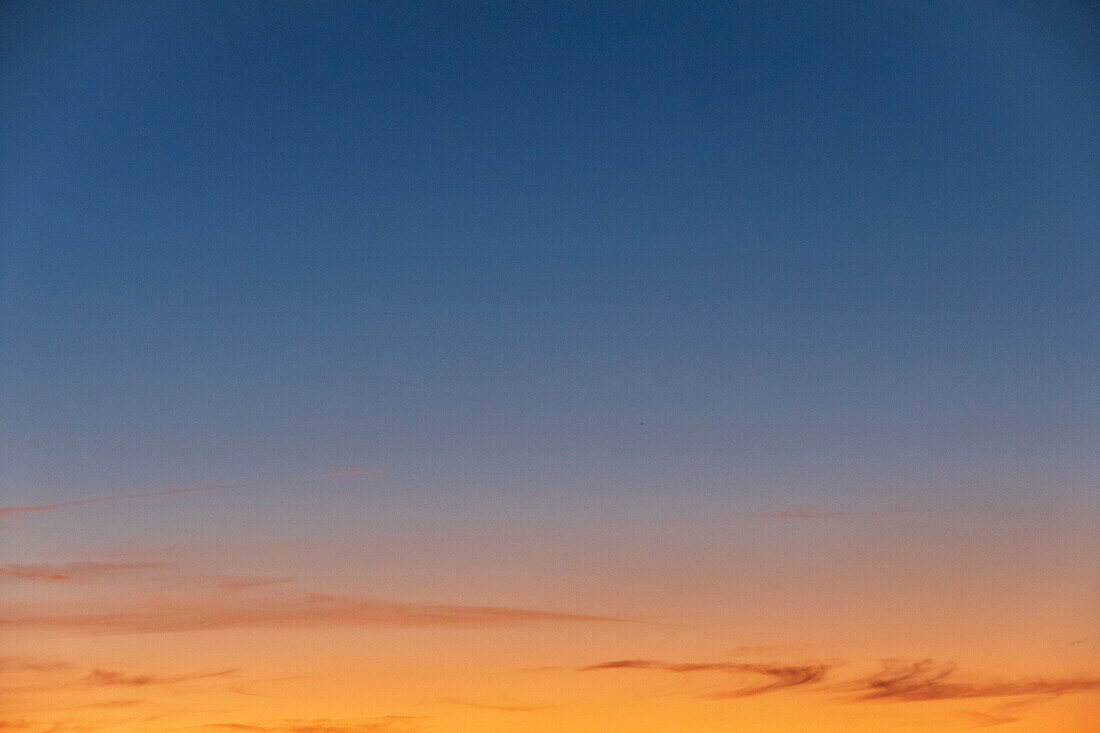 Blue and yellow sunset sky