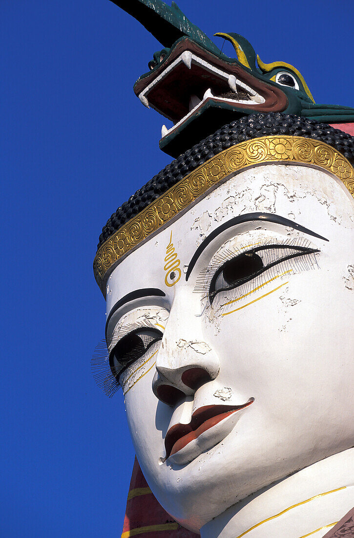 Myanmar, Mandalay, Giant Buddha statue in Buddhist temple