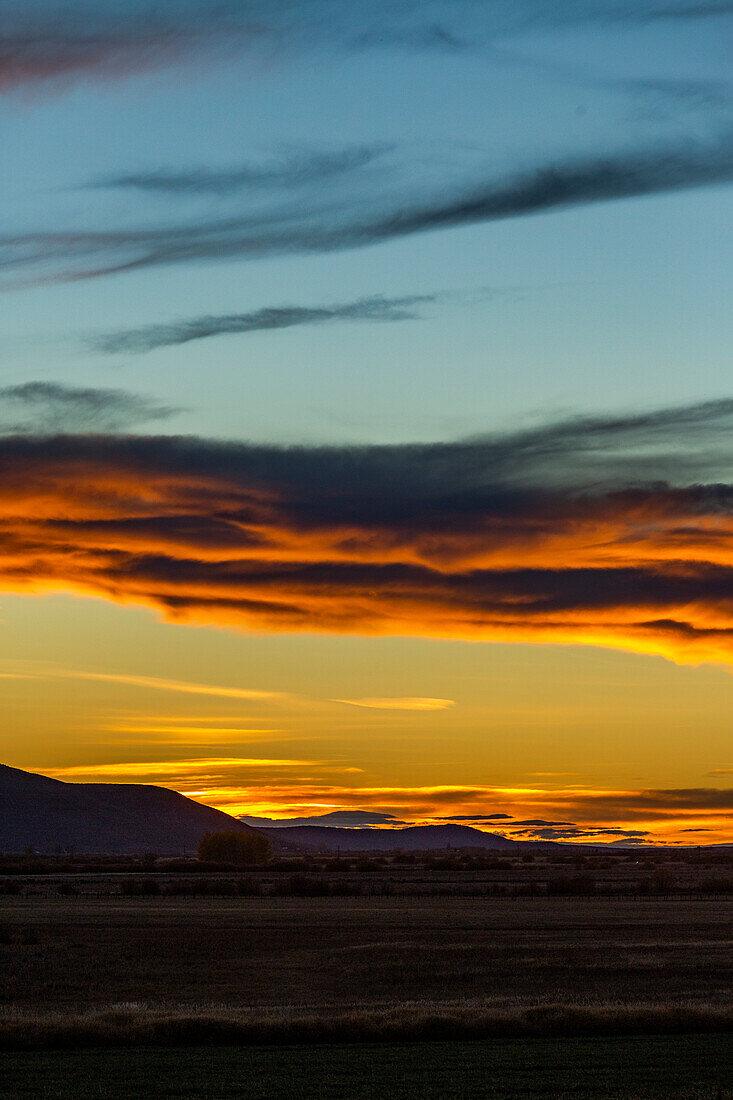 USA, Idaho, Bellevue, Hills and clouds at sunset