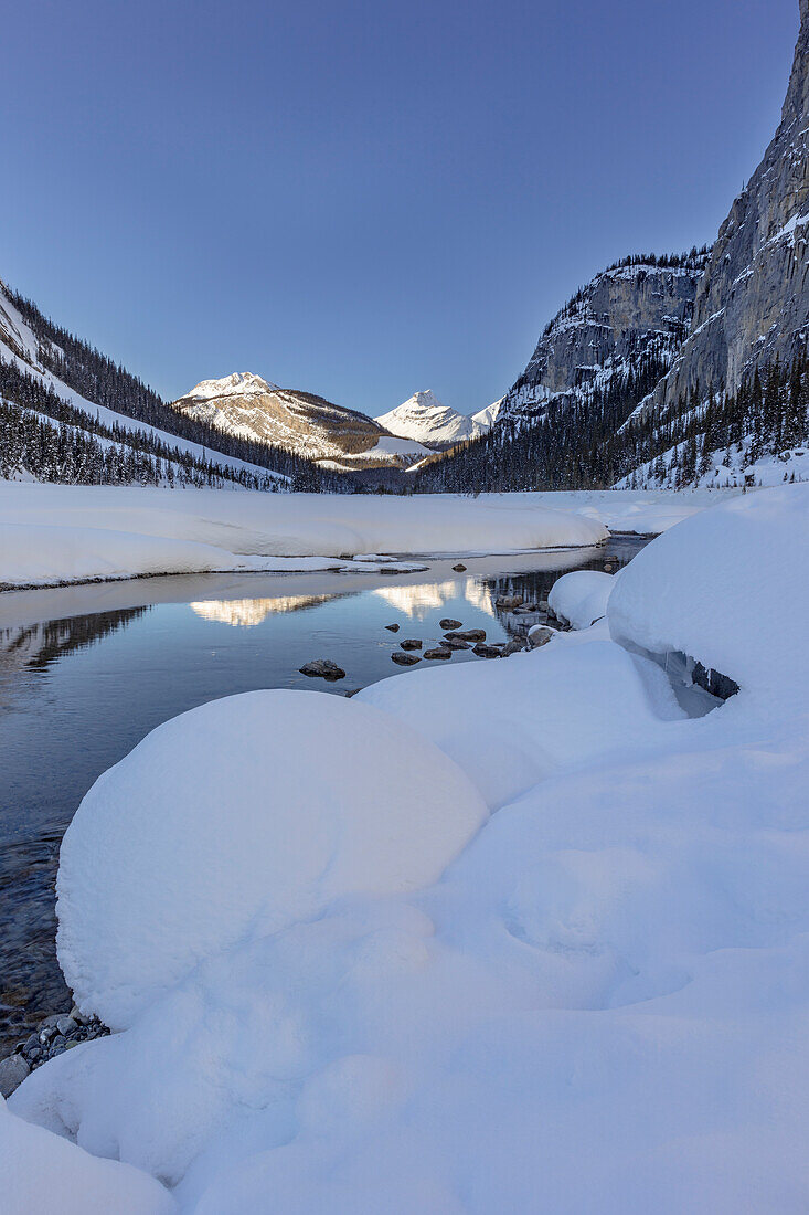 The North Saskatchewan River in winter in Banff National Park, Alberta, Canada.