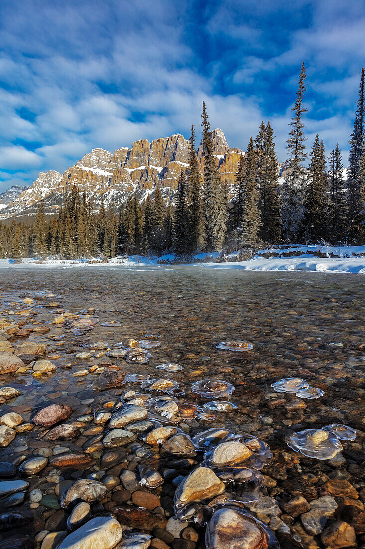 Castle Mountain along the Bow River in winter in Banff National Park, Alberta, Canada.